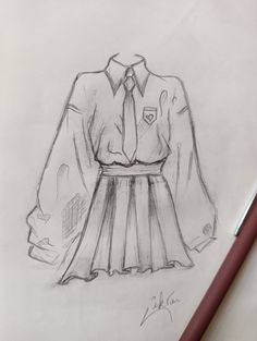 a drawing of a dress shirt and tie on a piece of paper next to a pen