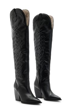 This over-the-knee cowboy boot is ready to do the Texas two step with its classic silhouette detailed with intricate stitchwork, a pointed toe and Cuban heel. 3 1/2" heel 21" shaft Inset side-zip closure Cushioned footbed Leather upper and lining/rubber sole Made in Spain One or more major components contains at least 50% leather sourced from a tannery that has achieved a Leather Working Group rating for its energy use, waste production and water treatment Emo Boots, Texas Two Step, Black Leather Cowboy Boots, Cowboy Stuff, Black Cowboy Boots, Two Step, Cuban Heels, Western Boots Women, Western Boot