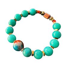 The Amazonite Stone Hope Beaded Bracelet is a stunning, handmade and unique piece of jewelry that features a combination of amazonite stone beads, gold color hematite stone spacers, African beads, and gold hematite stone beads. The pale blue-green amazonite beads have a smooth and polished finish, and are known for their calming and soothing properties. The gold hematite stone spacers add a touch of elegance and shine, while the African beads give the handmade bracelet a beautiful cultural touch Green Amazonite, Amazonite Stone, Find Balance, Hematite Stone, African Beads, Handmade Bracelet, Bracelet Handmade, Intricate Design, Inner Peace