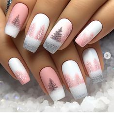 white and pink nails with trees on them