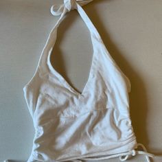 Never Worn- Amazing Quality White Cotton Triangle Halter Top, Fitted Cotton Halter Top For Day Out, White Fitted V-neck Halter Top, Fitted V-neck Halter Top For Summer, Fitted White V-neck Halter Top, Spring Vacation Fitted Halter Top, Solid Cotton Halter Top For Summer, Trendy Fitted Halter Top For Vacation, Fitted Solid Halter Top For Spring