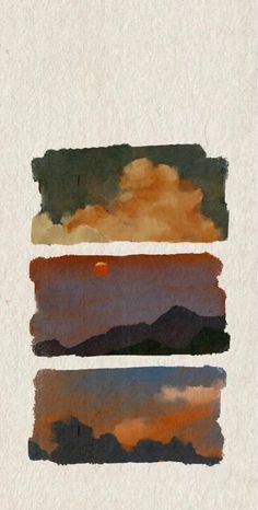 three different colored watercolors on paper with clouds and mountains in the sky above them