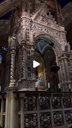 the inside of a church with an ornate alter and stained glass windows on it's sides