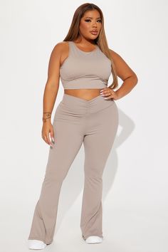 Available In Sage And Taupe. Super Soft Active Top Sleeveless High Neckline Underbust Binding Back Cut Out Ruching Back Tie Pair with "Pilates Girl Active Flare Pant" 75% Nylon 25% Spandex Imported | Pilates Girl Active Top in Taupe size 2X by Fashion Nova Sleeveless Elastane Sports Bra For Yoga, Fitted Sleeveless Elastane Sports Bra, Sleeveless Elastane Tank Top For Pilates, Sleeveless Seamless Stretch Activewear, Seamless Sleeveless Stretch Activewear, Seamless Stretch Sleeveless Activewear, Casual Sleeveless Elastane Activewear, Stretch Sleeveless Activewear With Built-in Bra, Sleeveless Activewear For Pilates In Spring