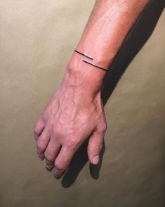 Small Hand Tattoo Designs Men, Minimal Arm Tattoos, Arm Bracelet Tattoo, Small Hand Tattoo Designs, Hand Tattoo Designs Men, Potrait Tattoo, Circle Tattoo Design, Ashley Harris, Wrap Around Wrist Tattoos