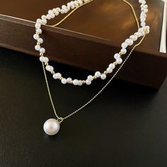 ✦ Make a statement with our Elegant Layered Pearl Necklace. This stunning necklace showcases multiple layers of luminous pearls, creating a chic and fashionable layered effect. The intricate design and the elegant pendant enhance the beauty of the pearls, adding a touch of glamour to your ensemble. Whether dressed up or down, this layered pearl necklace is a perfect accessory to elevate your style and capture attention wherever you go. ----------- DETAILS ------------ SKU: HN8552- Materials: Bra White Pearl Charm Chain Necklace For Layering, Elegant Multi-strand Necklace With Pearl Pendant, Elegant Pearl Necklace For Layering With Round Beads, Elegant Pearl Necklace For Layering, White Pearl Chain Necklace For Layering, White Pearl Necklace For Layering, Multi-strand Pearl Necklace For Layering, White Pearl Layering Necklaces, White Multi-strand Clavicle Chain Jewelry