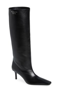 A slim heel balances the chisel toe of a lambskin leather boot in a pair-with-everything neutral hue. 2 3/4" (70mm) heel 16 1/4" shaft; 15 3/4" calf circumference Pull-on style Leather upper, lining and sole Made in Italy Women's Designer Shoes Classic Heeled Boots With Reinforced Heel And Square Toe, Business Boots With Sculpted Heel Medium Width, Sleek Calf Leather Knee-high Boots With Square Toe, Classic Square Toe Wide Calf Heeled Boots, Formal Heeled Boots With Square Toe And Medium Width, Formal Heeled Boots With Square Toe, Formal Square Toe Knee-high Boots, Formal Knee-high Boots With Square Toe, Classic Square Toe Boots With Branded Heel