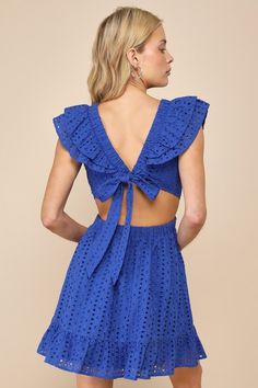 Summer days have never been better than when you're wearing the Lulus Blissful Sunshine Royal Blue Eyelet Backless Mini Dress! Lightweight woven cotton shapes this breezy dress that boasts eyelet embroidery throughout. Ruffled, elasticized straps support a flirty bodice with a plunging V-neckline and a tying detail across the open back. Elastic waist tops a flaring skirt that ends at a ruffled mini hem. Fit: This garment fits true to size. Length: Mid-thigh. Size medium measures 30" from shoulde Cotton Eyelet Dress For The Beach, Beach Cotton Eyelet Dress, Eyelet Cotton Dress For Vacation, Blue Eyelet Dress For Summer, Cotton Eyelet Dress For Brunch, Summer Eyelet Dress For Beach, Summer Eyelet Beach Dress, Summer Beach Mini Dress With Eyelet Details, Summer Beach Eyelet Dress