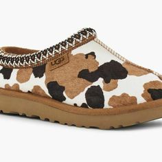 Women's Ugg, Tasman Slipper. These Comfortable Slippers Feature The Same Light, Durable Outsole As Our Classic Boot For Indoor-Outdoor Wear. You'll Love The Fun Animal Print Upper Design And Plush Linings. Genuine Cow Hair With Cow Print Upper 17mm Uggplush 80% Wool, 20% Lyocell Lining 17mm Uggplush 80% Wool, 20% Lyocell Insole Treadlite By Ugg Outsole Is Perfect For Indoor / Outdoor Wear Embossed Ugg Logo Cute Uggs, Ugg Coquette, Nike Shoes Women Fashion, Ugg Tasman Slippers, Western Shoes, Cowgirl Accessories, Preppy Shoes, Pretty Shoes Sneakers, Ugg Tasman