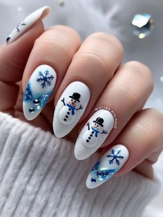 "Transform your nails into a winter wonderland with frosty snowman nail inspiration! These magical designs will make your nails look like a snowy paradise. Perfect for adding a touch of winter magic to your look. Save this pin for winter wonderland nail ideas! #SnowmanNails #WinterNails #HolidayNailArt #WinterWonderland #FestiveNails" Snowman Nails Design, Frosty Snowman, Holiday Nail Art, Winter Magic, Festival Nails, Nail Inspiration, Winter Nails