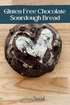 gluten free chocolate sourdough bread on a wooden surface with text overlay