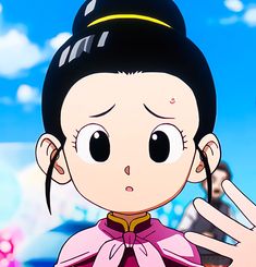 an animated image of a woman with black hair and big eyes holding her hand up in front of her face