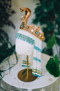 new turquoise Cleopatra crown 💙🐍🌞✨ #carbickova #carbickovacrowns #crown #headband #headpiece #tiara #headdress #halo #jewellery #jewelry #jewelleryaddict #jewelryaddiction #handmadejewelry #Cleopatra ##cleopatramakeup #cleopatracostume #costume #etsy #festivalfashion #coachella #festival #festivaloutfit #burningman #halloween #halloweencostume #turquoise #turquoisejewelry #pearl #pearljewelry Bohemian Crown Costume Hat For Carnival, Bohemian Crown For Carnival, Bohemian Crown Headpiece For Carnival, Bohemian Teardrop Crown For Festivals, Bohemian Crown Costume Hat For Costume Party, Bohemian Crown Costume Hat For Weddings, Bohemian Costume Hat With Tall Crown, Bohemian Wedding Crown Costume Hat, Bohemian Costume Hat With Tall Crown For Parties