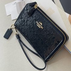 (New+Tag) Coach Signature Double Zip Wallet /Wristlet Black Embossed Patent Leather Double Zip Wristlet Gold Hardware Signature Monogram 6.25 X 3.75 Inch Everyday Black Coach Wallet, Chic Black Coach Wallet, Coach Black Evening Wristlet, Black Coach Wristlet For Travel, Luxury Black Coach Wallet, Gold Wallet, Black Wristlet, Purse Brands, Cute Wallets