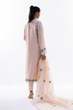 This timeless long shirt silhouette is cut from khaddi silk and is rendered with our signature floral embroidery. An organza dupatta with worked borders and rawsilk trousers complement the look. Eid Chanderi Kaftan With Floral Embroidery, Eid Organza Dupatta With Floral Embroidery, Eid Floral Embroidered Chanderi Kaftan, Designer Floral Embroidered Organza Dupatta, Floral Embroidered Chiffon Dupatta, Sania Maskatiya, Organza Shirt, Shirt Silhouette, Website Features