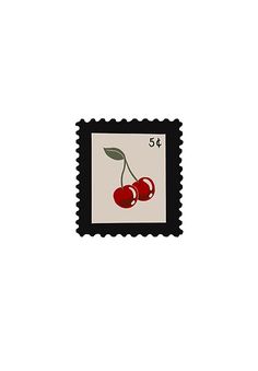 a postage stamp with an image of two cherries on the front and one in the back