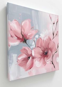 pink flowers painted on canvas mounted to the wall