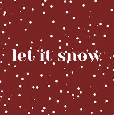 the words let it snow are in white letters on a red background with small dots