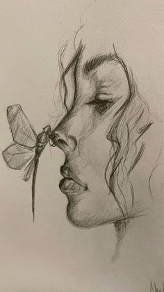 a pencil drawing of a woman's face with a dragonfly on her nose