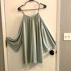 This Dress Is Perfect Paired With Your Favorite Booties For Spring! Summer Flowy Cold Shoulder Dresses, Spring Flowy Cold Shoulder Dress, Flowy Cold Shoulder Summer Dresses, Spring Blue Cold Shoulder Dress, Blue Cold Shoulder Dress For Spring, Chic Cold Shoulder Mini Dress For Spring, Casual Cold Shoulder Mini Dress For Spring, Casual Cold Shoulder Party Dress, Spring Cold Shoulder Mini Dress For Day Out