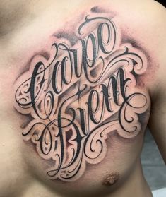 a man's chest with the words carpo crean written in cursive writing