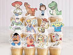 there are many cartoon characters on the cupcakes