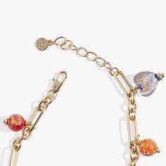 Make a chic style statement with the Murano Beads Adjustable Charm Bracelet. Murano-style glass beads are a stunning blend of history and artistry. Handcrafted by skilled artisans, each bead showcases intricate designs and vibrant colors, a testament to the centuries-old glassmaking traditions of Murano, Italy. This beaded charm bracelet features an open-link adjustable chain and multi-color glass bead charms in varying shapes and sizes for an eclectic glam look. Glass Bracelet Jewelry For Party, Party Bracelets With Colorful Glass Beads, Czech Glass Bracelet Jewelry, Party Bracelets With Colorful Czech Glass Beads, Elegant Adjustable Beaded Bracelets With Dangling Beads, Czech Glass Beaded Bracelets With Lobster Clasp, Adjustable Glass Jewelry With Dangling Beads, Adjustable Beaded Chain Glass Bracelet, Adjustable Beaded Chain Bracelet In Glass