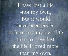 a poem written in white on blue paper with the words i have lost a life not my own, but it would have been easier to have lost my own