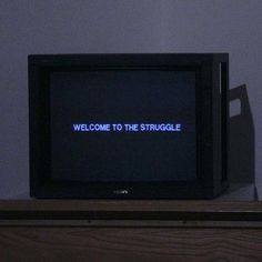 an old tv with the words welcome to the struggle on it