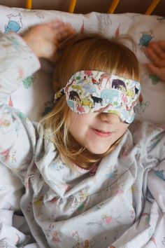 Child's sleep mask hand crafted in the luxurious Liberty London tana lawn cotton. Although it's 100% cotton, Tana lawn has a silk like texture and is really soft and comforting against the skin. This print is called ' queue for the zoo, and is perfect for boys and girls! Print placement will vary between eye masks Inside the mask is a layer of compact wadding which gently moulds to the shape of your face and also keeps the light out, making sure you have a well rested sleep. We have received man Kids Eye Mask, Well Rested, Sleep Masks, Kids Bedtime, Eye Masks, Liberty London, Gift For Boys, Sleep Well, Shape Of You