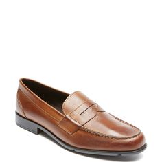 Rockport-Classic Penny Loafer Comfort and style collide in this classic penny loafer from Rockport! Featuring sport technology for superior comfort and a stylish yet traditional design, this slip-on shoe will keep you looking and feeling good all day long. Classic Plain Toe Slip-resistant Loafers, Classic Slip-resistant Plain Toe Loafers, Classic Moc Toe Slip-resistant Loafers, Classic Slip-on Slip-resistant Loafers, Classic Slip-resistant Loafers With Round Toe, Classic Slip-resistant Moc Toe Loafers, Classic Slip-on Loafers With Slip-resistant, Slip-resistant Classic Moc Toe Loafers, Classic Slip-resistant Moc Toe Slip-ons