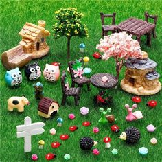 a bunch of toys that are sitting in the grass