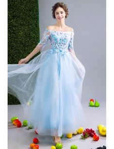 Blue Spring Banquet Dress, Blue Long Sleeve Dress For Prom Season, Light Blue Evening Gown For Spring, Floor-length Blue Dresses For Spring, Blue Prom Dress For Spring Season, Blue Prom Dress For Spring, Blue Tulle Gown For Spring, Blue Full-length Dress For Banquet, Full Length Blue Dress For Banquet