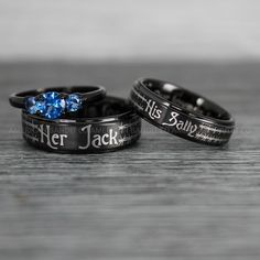 two harry potter wedding rings with blue crystal stones