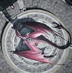 a pink dragon statue sitting on top of a brick walkway