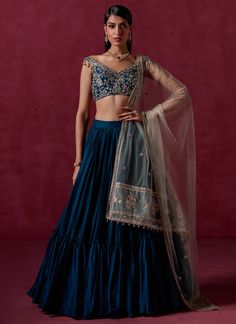 Our Teal Blue Embroidered Crepe Silk Lehenga includes a crepe silk top with santoon inner, crepe silk bottom with santoon inner, and a net dupatta. Embroidery is present on this style using sequins, thread, and zari embellishments. Like all of our pieces, this piece is made in India and checked by hand to ensure high q Fashion Course, Dupatta Embroidery, Engagement Lehenga, Kurta Lehenga, Blouse Lehenga, Lehenga Pattern, Half Saree Lehenga, Henna Night, Blue Lehenga