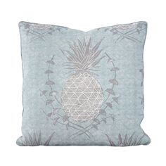 a blue pillow with a pineapple on it