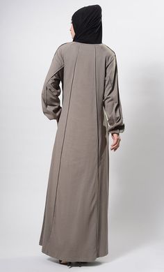 Featuring a classic comfortable flared abaya dress in sinker base with french seams on the sides and balloon shaped sleeves with elasticated edges. It is a casual everyday wear informal abaya dress. FIT : Relaxed fit.COMPOSITION : Sinker.CARE : Dry clean only. Web Detail, Abaya Dress, French Seam, Casual Everyday, Everyday Wear, Composition, Dry Clean, Relaxed Fit, How To Wear