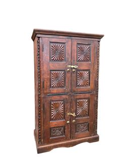 an old wooden cabinet with ornate carvings on the front and side doors, isolated against a white background