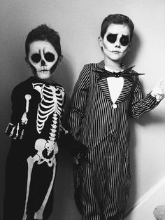 two children dressed up in skeleton costumes