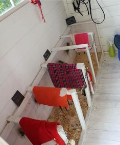 some red and white chairs in a room