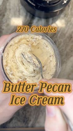 a person holding a spoon in their hand over a bowl of ice cream with the words, 20 calories butter pecan ice cream