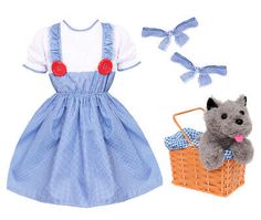 a doll is next to a basket with a stuffed animal in it and an image of a cat