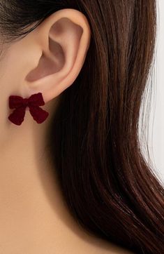 Cute Bow Shaped Earrings These cute bow shaped earrings are a must-have for any fashion-forward individual. Made with precision and attention to detail, these earrings add a touch of charm and playfulness to any outfit. The perfect accessory to elevate your style and make a statement. Red Bow Necklace, Bow Earrings For Gift, Valentine's Day Party Jewelry With Red Bow, Cute Butterfly Knot Jewelry For Parties, Chic Butterfly Knot Earrings For Party, Butterfly Knot Drop Earrings, Bow Earrings For Valentine's Day Gift, Elegant Jewelry With Red Bow For Gifting, Butterfly Knot Drop Earrings For Gift