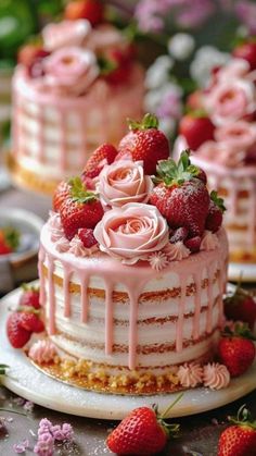 strawberry cake with pink icing and fresh strawberries on the top, surrounded by flowers