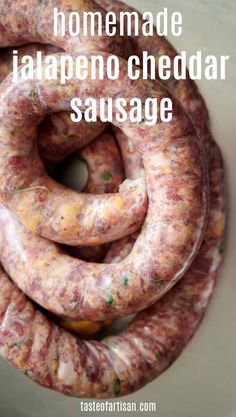 homemade jalapeno cheddar sausage is shown in this image