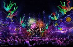 fireworks and streamers are lit up in the night sky above a crowd at an amusement park