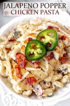 the cover of jalapeno popper chicken pasta is shown on a white plate