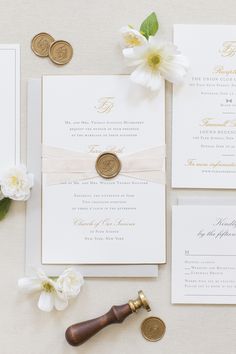 the wedding stationery is laid out and ready to be used