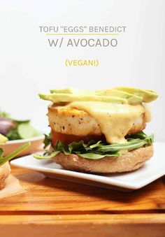 an egg sandwich with avocado on a plate